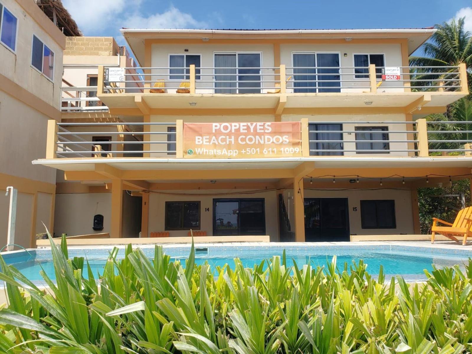 Beach Club Budget Rooms At Popeyes Caye Caulker Exterior photo
